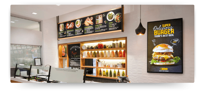 A restaurant that is using digtal displays to share their menu and feature products.