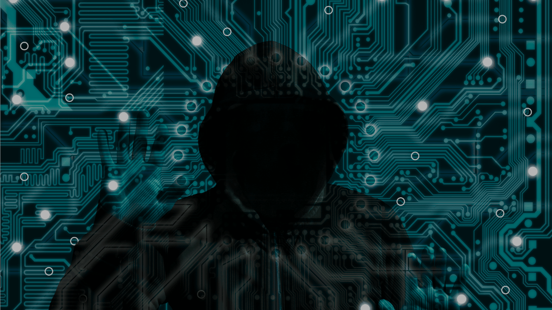 Digital Graphics around the image of a hooded hacker