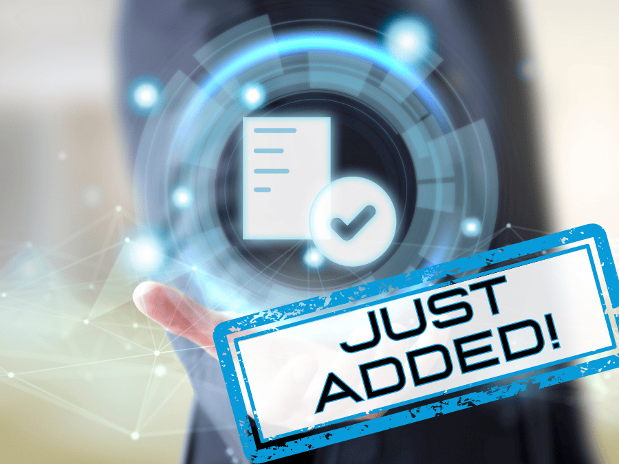 A person holding a digital document icon. There is a large stamp over the image reading, "Just Added!"