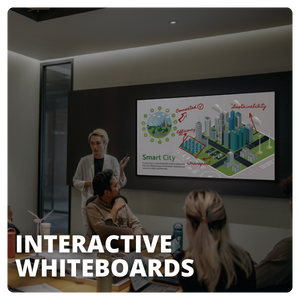 A person presenting a slide on an interactive whiteboard in an office conference room.