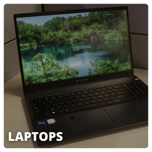 A laptop sitting on a desk.