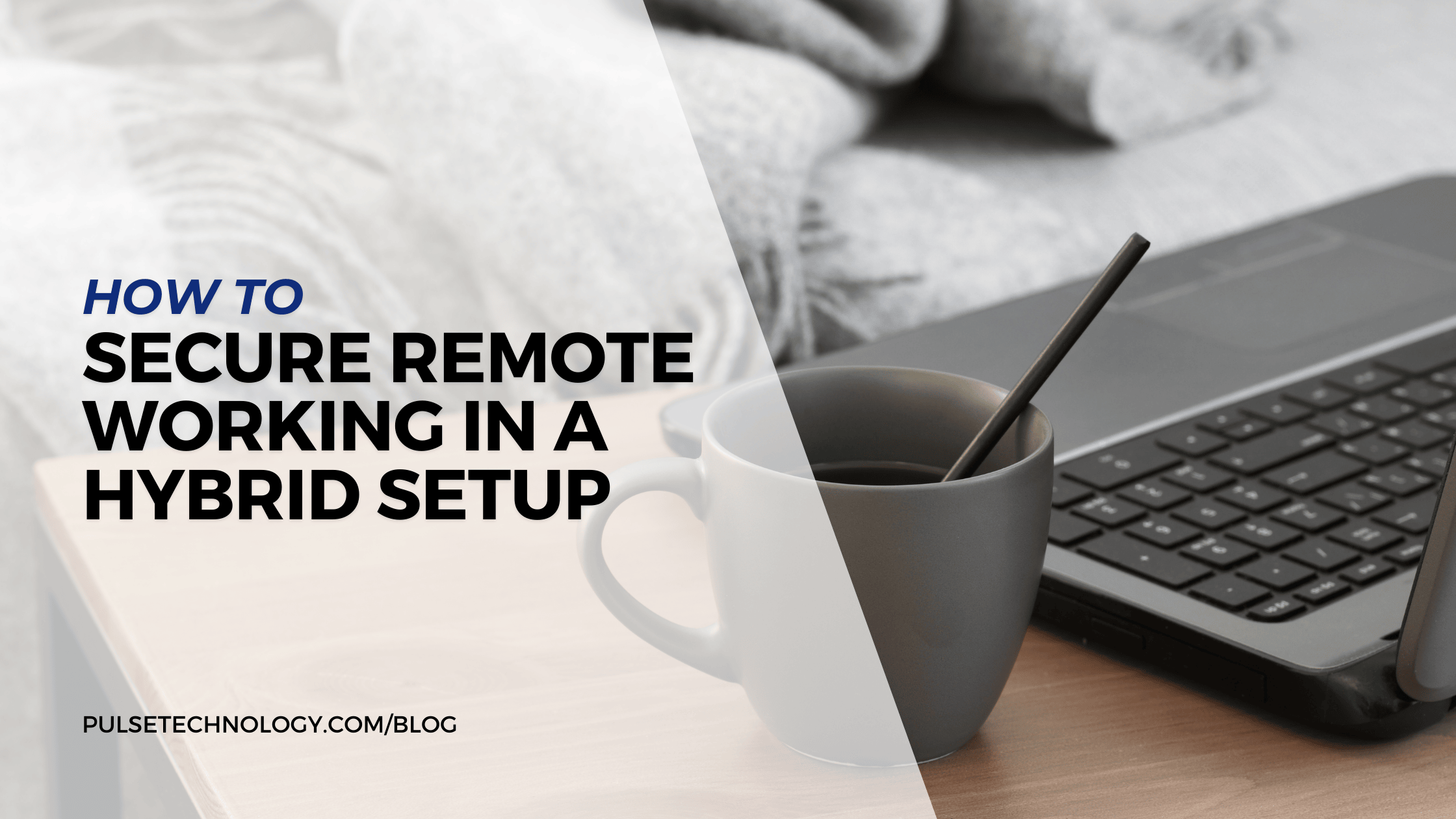 A computer on a coffee table next to a couch that has a blanket draped over it. Next to the laptop is a coffee cup.